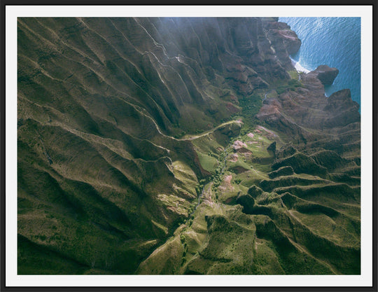 Over the Edge | Aerial Odyssey over Na Pali - Living Moments Media - 3500-5500, 800-3500, Abstract, Acrylic, aerial, Artwork, beach, Best Moments, Best Sellers, black, blue, Canvas, Coast, Cove, green, Hawaii, Helicopter, Honopu Beach, horizontal, Island, Kauai, Maui, Metal, Moody, Mountains, Na Pali Coast, new arrivals, New Moments, ocean, open-edition, over-5500, Prints, rocks, sand, size-18-x-24, size-30-x-40, size-42-x-56, Surf, trail, Trees, Visual Artwork, waves