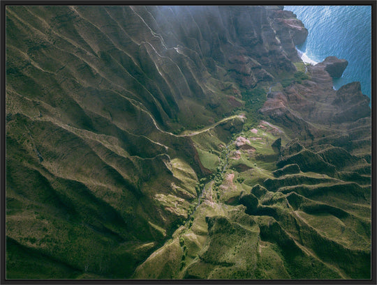 Over the Edge | Aerial Odyssey over Na Pali - Living Moments Media - 3500-5500, 800-3500, Abstract, Acrylic, aerial, Artwork, beach, Best Moments, Best Sellers, black, blue, Canvas, Coast, Cove, green, Hawaii, Helicopter, Honopu Beach, horizontal, Island, Kauai, Maui, Metal, Moody, Mountains, Na Pali Coast, new arrivals, New Moments, ocean, open-edition, over-5500, Prints, rocks, sand, size-18-x-24, size-30-x-40, size-42-x-56, Surf, trail, Trees, Visual Artwork, waves