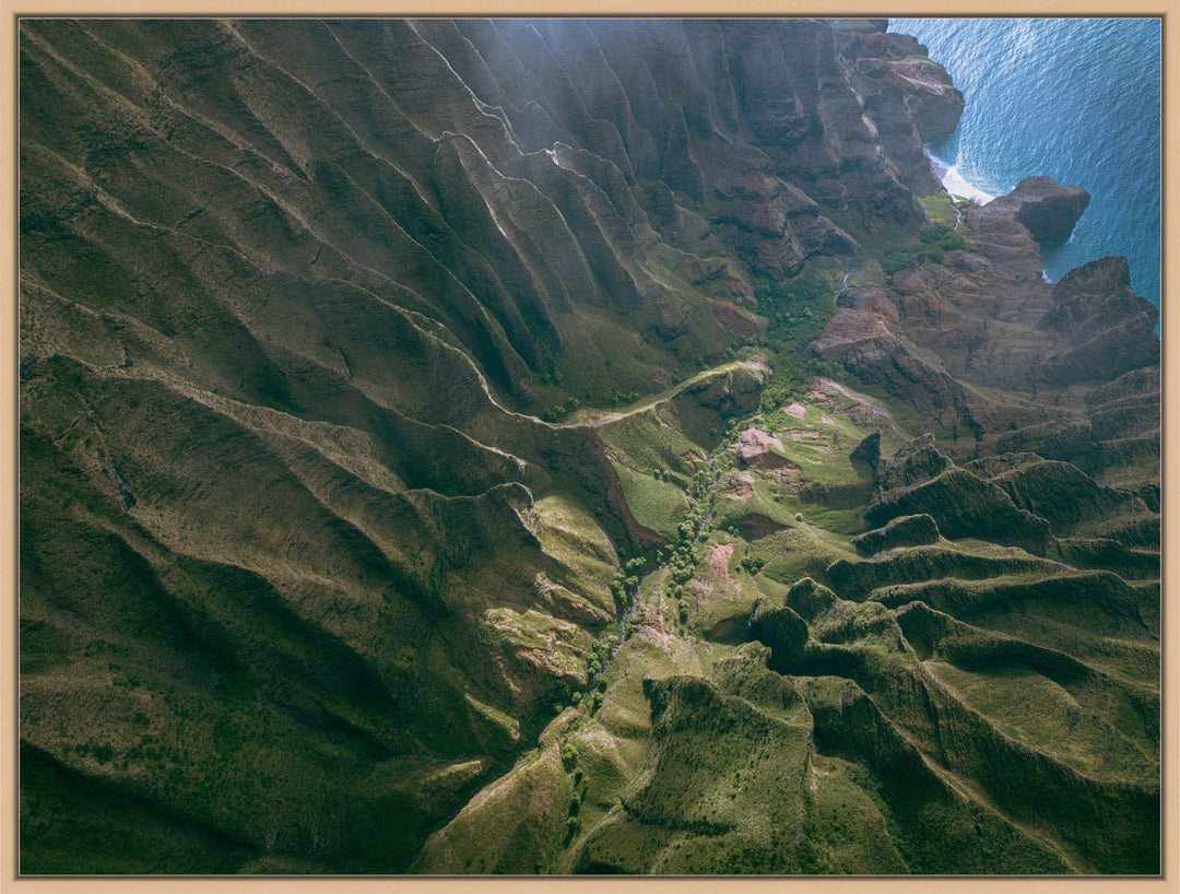 Over the Edge | Aerial Odyssey over Na Pali - Living Moments Media - 3500-5500, 800-3500, Abstract, Acrylic, aerial, Artwork, beach, Best Moments, Best Sellers, black, blue, Canvas, Coast, Cove, green, Hawaii, Helicopter, Honopu Beach, horizontal, Island, Kauai, Maui, Metal, Moody, Mountains, Na Pali Coast, new arrivals, New Moments, ocean, open-edition, over-5500, Prints, rocks, sand, size-18-x-24, size-30-x-40, size-42-x-56, Surf, trail, Trees, Visual Artwork, waves