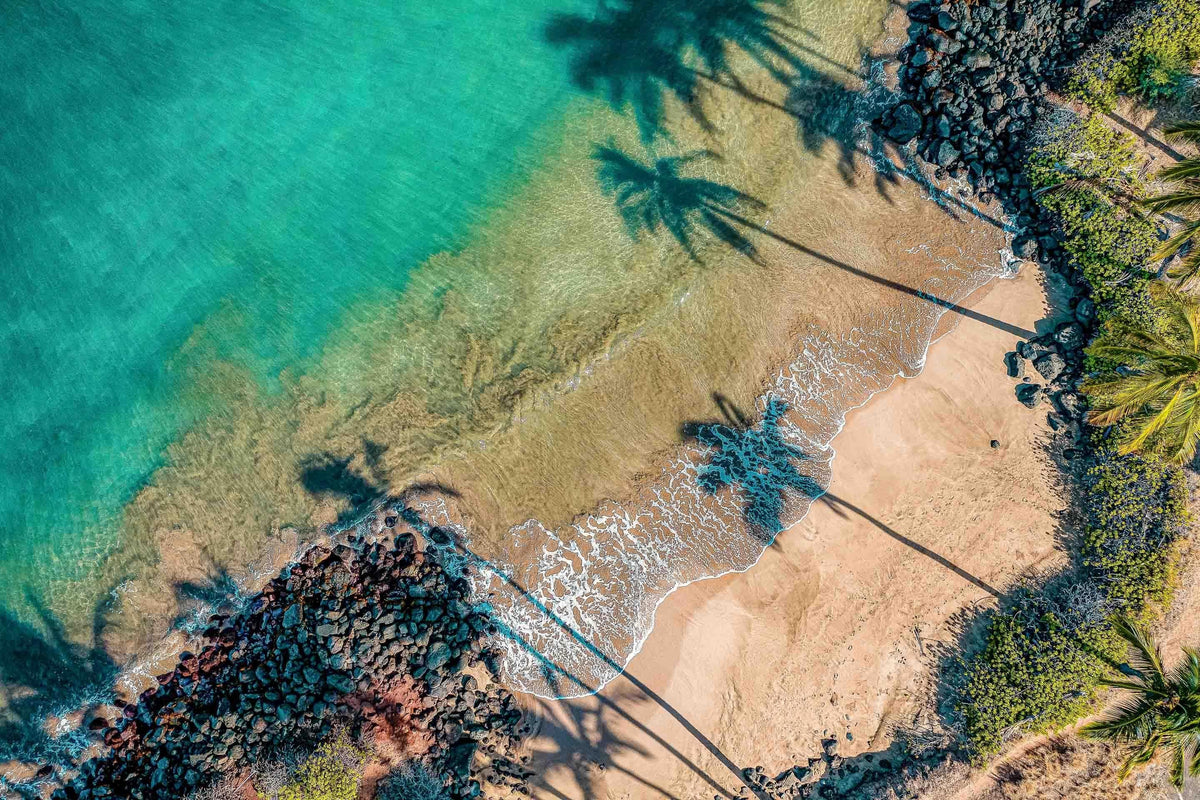 Another Day In Paradise by Lance Ehrecke, aerial photograph of Kalepolepo Beach in Kīhei, Maui.