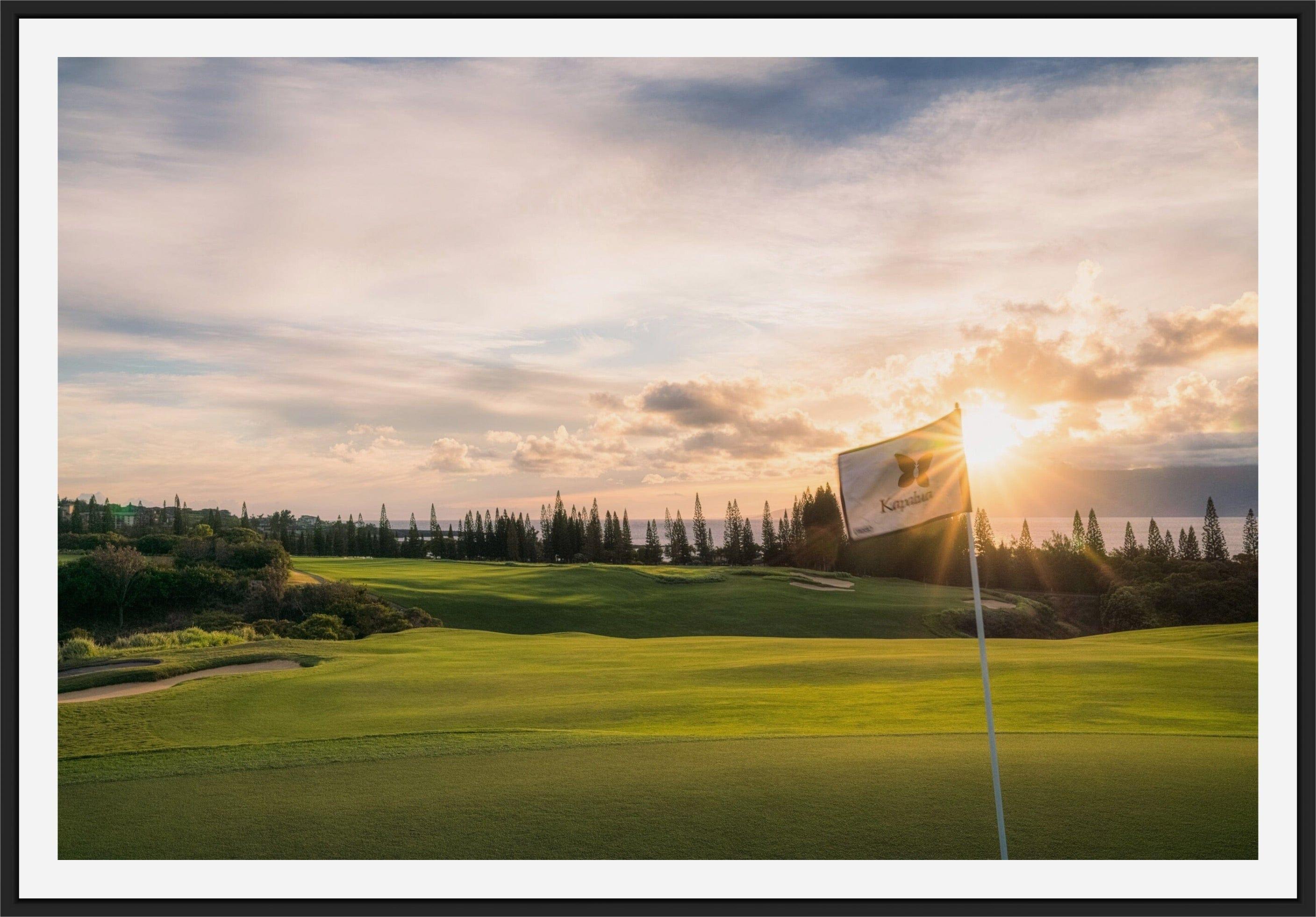 Kapalua flag on the Plantation Course 18th green at sunset