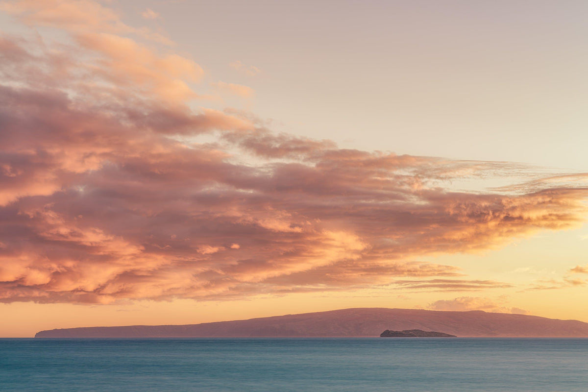Molokini Serenade by Lance Ehrecke, sunset photograph of Molokini Crater with Kahoʻolawe beyond.