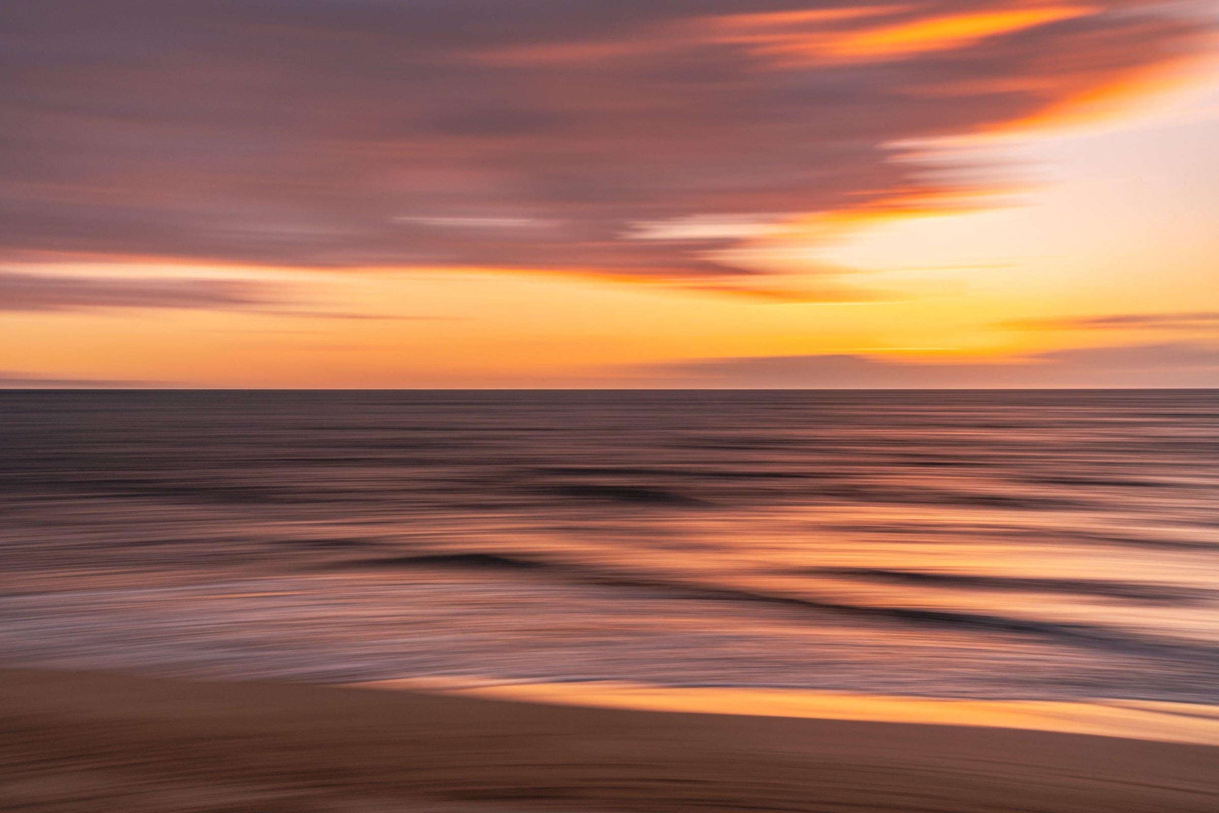Rhapsody by Lance Ehrecke, abstract sunset photograph created with intentional camera movement at Sugar Beach in Kīhei, Maui.